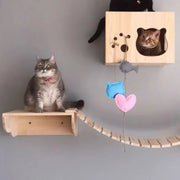 Wooden cat climbing frame with luxury wall-mounted shelves and a cozy cat house. Ideal for cats to play, climb, and rest in a stylish home setting.